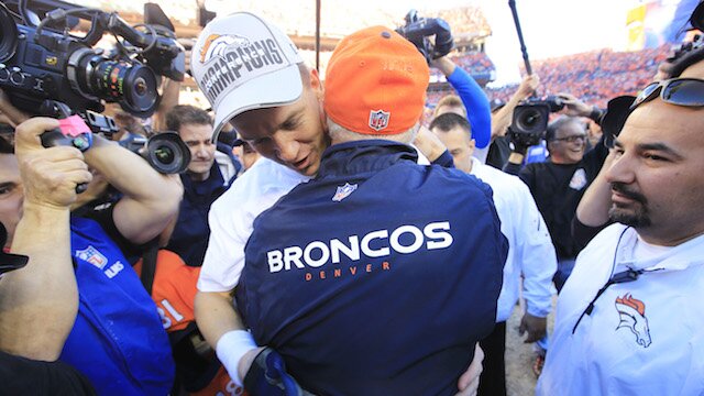 Peyton Manning hugs John Fox