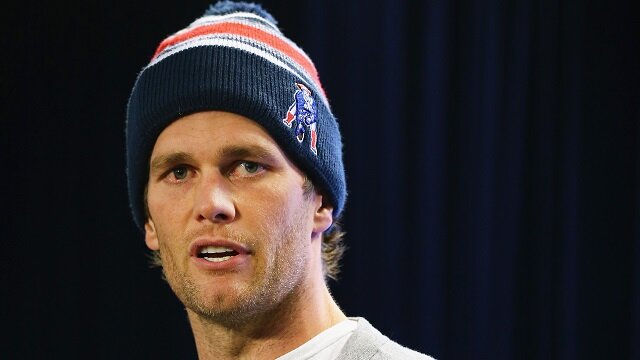 <>New England Patriots Quarterback Tom Brady talks to the media during a press conference to address the under inflation of footballs used in the AFC championship game at Gillette Stadium on January 22, 2015 in Foxboro, Massachusetts.