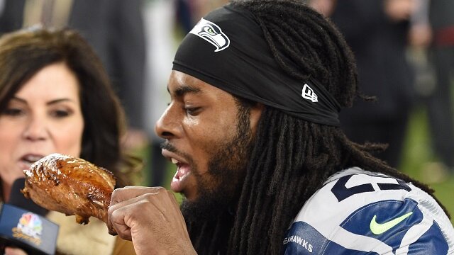 Seattle Seahawks cornerback Richard Sherman (25) eats a turkey leg after the Thanksgiving night game against the San Francisco 49ers at Levi's Stadium. The Seahawks defeated the 49ers 19-3.