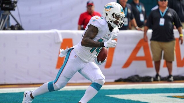 Jarvis Landry Miami Dolphins' Receiver Scoring a Touchdown