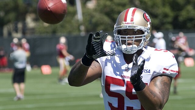 San Francisco 49ers linebacker Ahmad Brooks catches a pass during training camp.