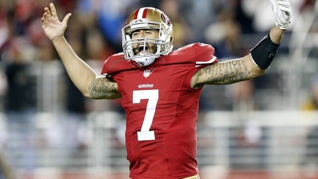 San Francisco 49ers quarterback Colin Kaepernick celebrates after he rushed for a 90 yard touchdown