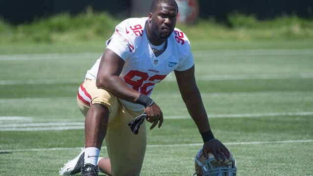 San Francisco 49ers defensive end Quinton Dial (92) stretches during training camp at the SAP Performance Facility.