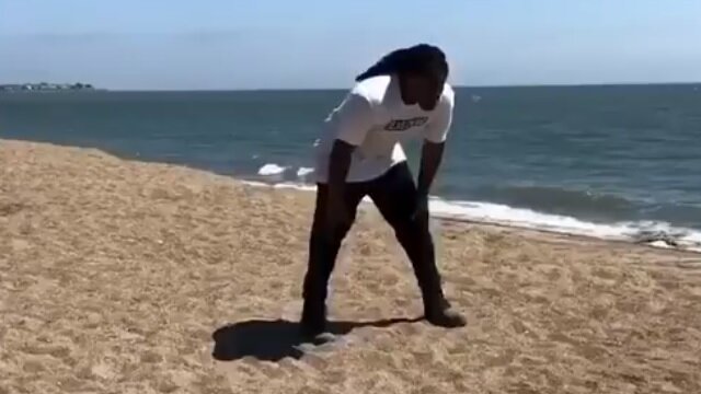 Marshawn Lynch Works Out on the Beach While Wearing Boots For Some Unknown Reason