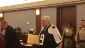 Cowboys Fan Facing Death Penalty Rocks Tony Romo Jersey To Court
