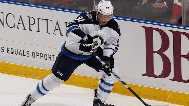  Jiri Tlusty of the Winnipeg Jets skates with the puck against the Florida Panthers at the BB&T Center on March 12, 2015 