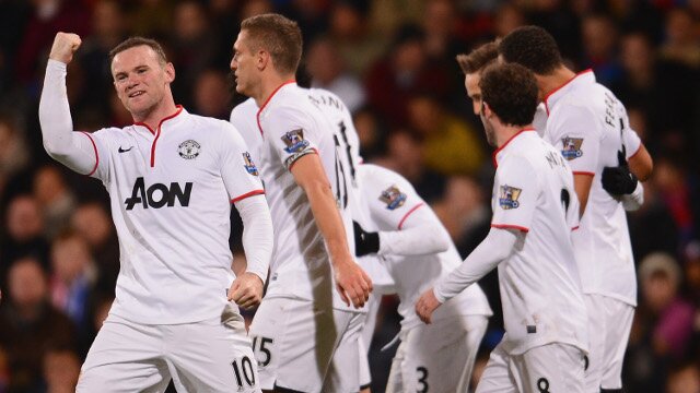 Wayne Rooney celebrates with Manchester United teammates