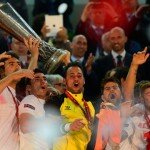 Sevilla lift the Europa League trophy after defeating Benfica