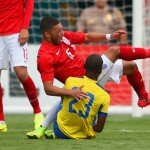 Alex Oxlade-Chamberlain suffers an injury against Ecuador
