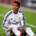 Real Madrid attacker Cristiano Ronaldo on the floor