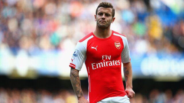 Arsenal midfielder Jack Wilshere shows his disappointment