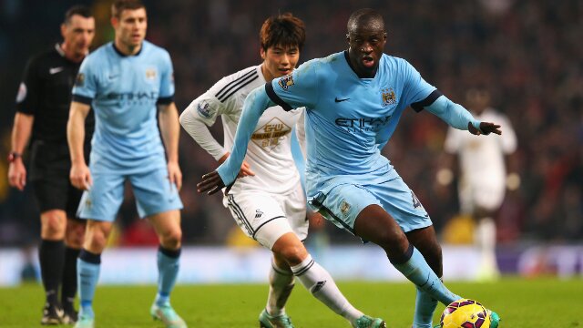 Yaya Toure playing for Manchester City