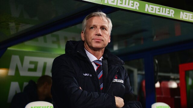 Crystal Palace manager Alan Pardew watches on from the bench