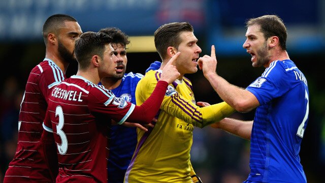 West Ham players argue with Chelsea's Branislav Ivanovic