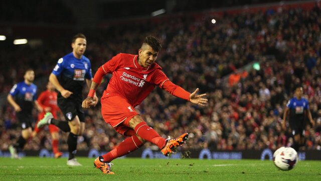 Liverpool playmaker Roberto Firmino takes a shot at goal