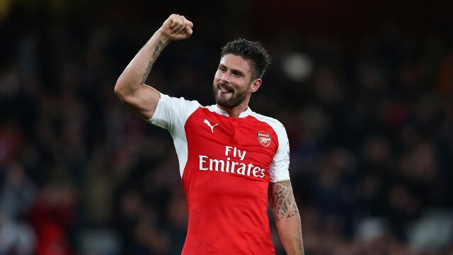 Olivier Giroud celebrates a win with the Arsenal fans