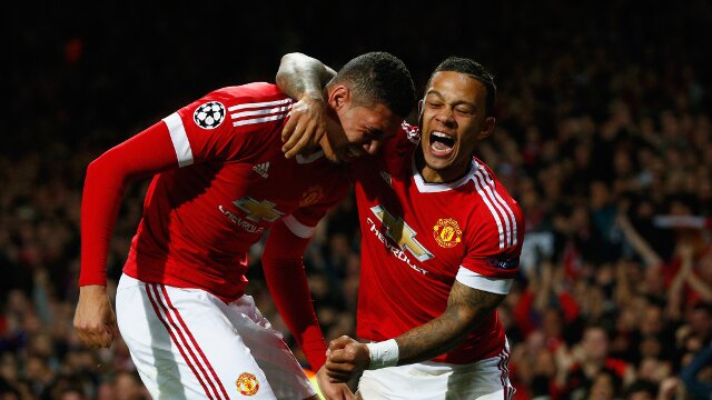 Chris Smalling and Memphis Depay celebrate a Manchester United goal