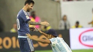 Watch A Fan Bow Down To Lionel Messi After Running Onto Pitch