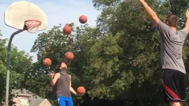 Watch This Juggling Pro Masterfully Juggle 5 Basketballs At Once