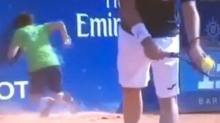 Watch Tennis Ball Boy Smash Into Wall At Barcelona Open