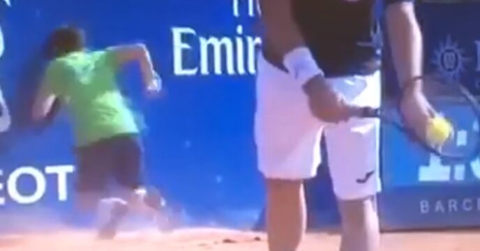 Watch Tennis Ball Boy Smash Into Wall At Barcelona Open