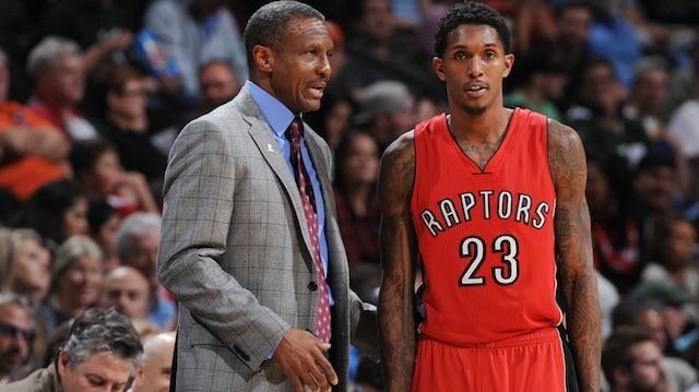 Head coach, Dwane Casey, of the Toronto Raptors talks to Louis Williams #23 during the game against the Denver Nuggets on December 28, 2014 at Pepsi Center in Denver, Colorado. (Photo by Garrett Ellwood/NBAE via Getty Images)