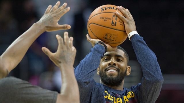 Kyrie Irving of the Cleveland Cavaliers warms up prior to the game against the Toronto Raptors at Quicken Loans Arena on November 22, 2014 in Cleveland, Ohio. (Photo by Jason Miller/Getty Images)