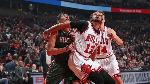 CHICAGO, IL - FEBRUARY 23: Joakim Noah #13 of the Chicago Bulls boxes out against Ersan Ilyasova #7 of the Milwaukee Bucks during the game on February 23, 2015 at the United Center in Chicago, Illinois. NOTE TO USER: User expressly acknowledges and agrees that, by downloading and or using this Photograph, user is consenting to the terms and conditions of the Getty Images License Agreement. Mandatory Copyright Notice: Copyright 2015 NBAE (Photo by Gary Dineen/NBAE via Getty Images)