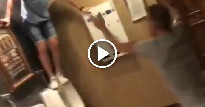 Three Friends Have an Awesome Fake Wrestling Match in Bar Bathroom