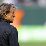 July 16, 2011; San Francisco, CA, USA; Manchester City head coach Roberto Mancini watches his team warm up before the game against Club America at AT&T Park. Manchester City defeated Club America 2-0.